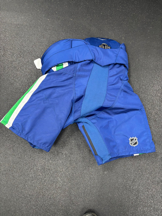 Slightly Used Vancouver Canucks Warrior Covert QRE 20 Senior Large Pro-Stock Hockey Pants