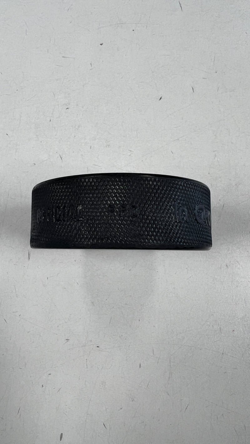Load image into Gallery viewer, Vintage Prince Albert Raiders Hockey Puck

