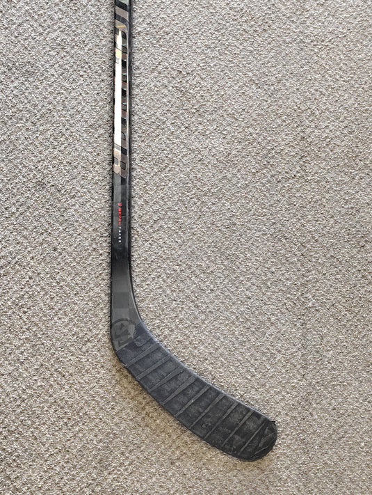 Used Warrior Novium INT (65 flex) Hockey Stick
