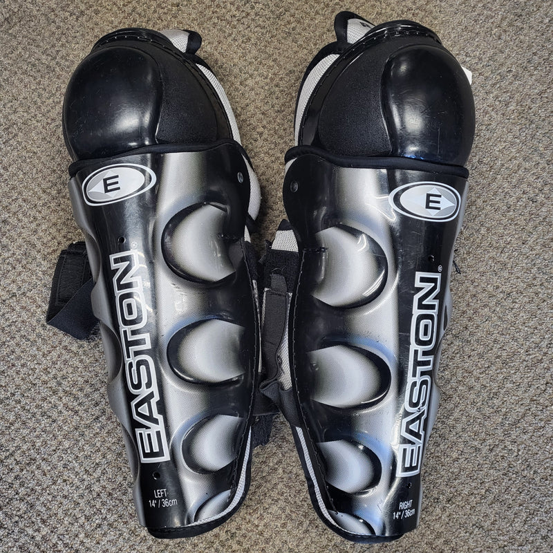 Load image into Gallery viewer, Used Easton UL Hockey Shin Guards 14"
