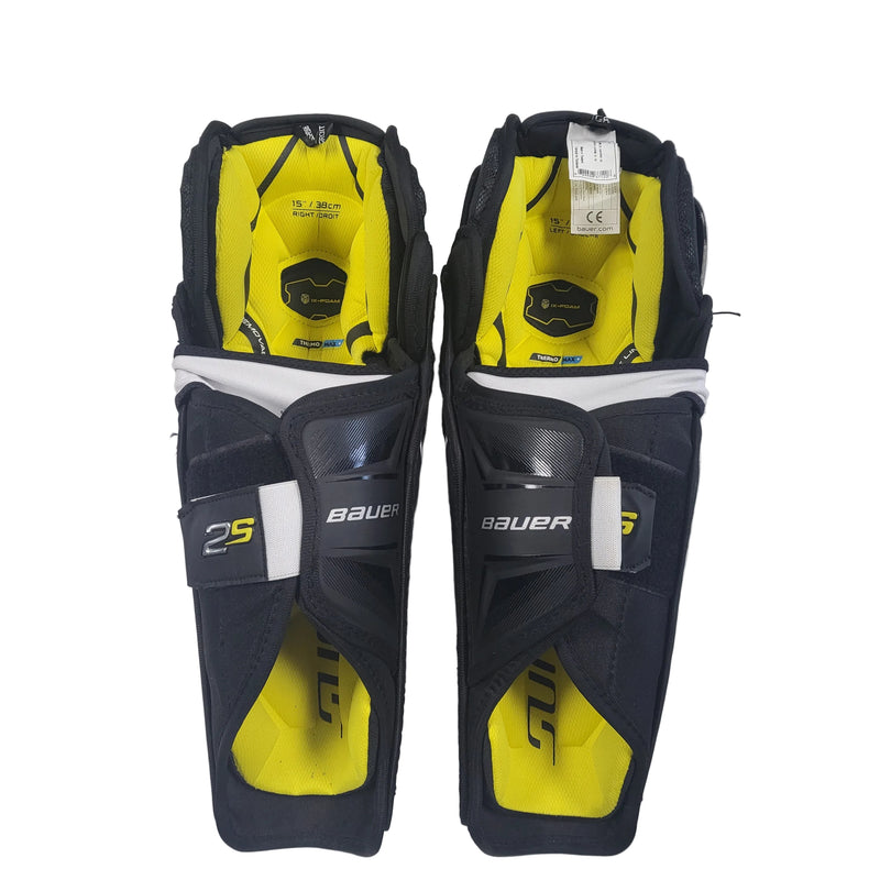 Load image into Gallery viewer, Used Bauer supreme shin guards size 15"
